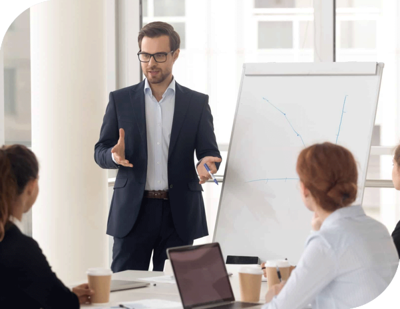 Man in Suit presenting a whiteboard presentation.